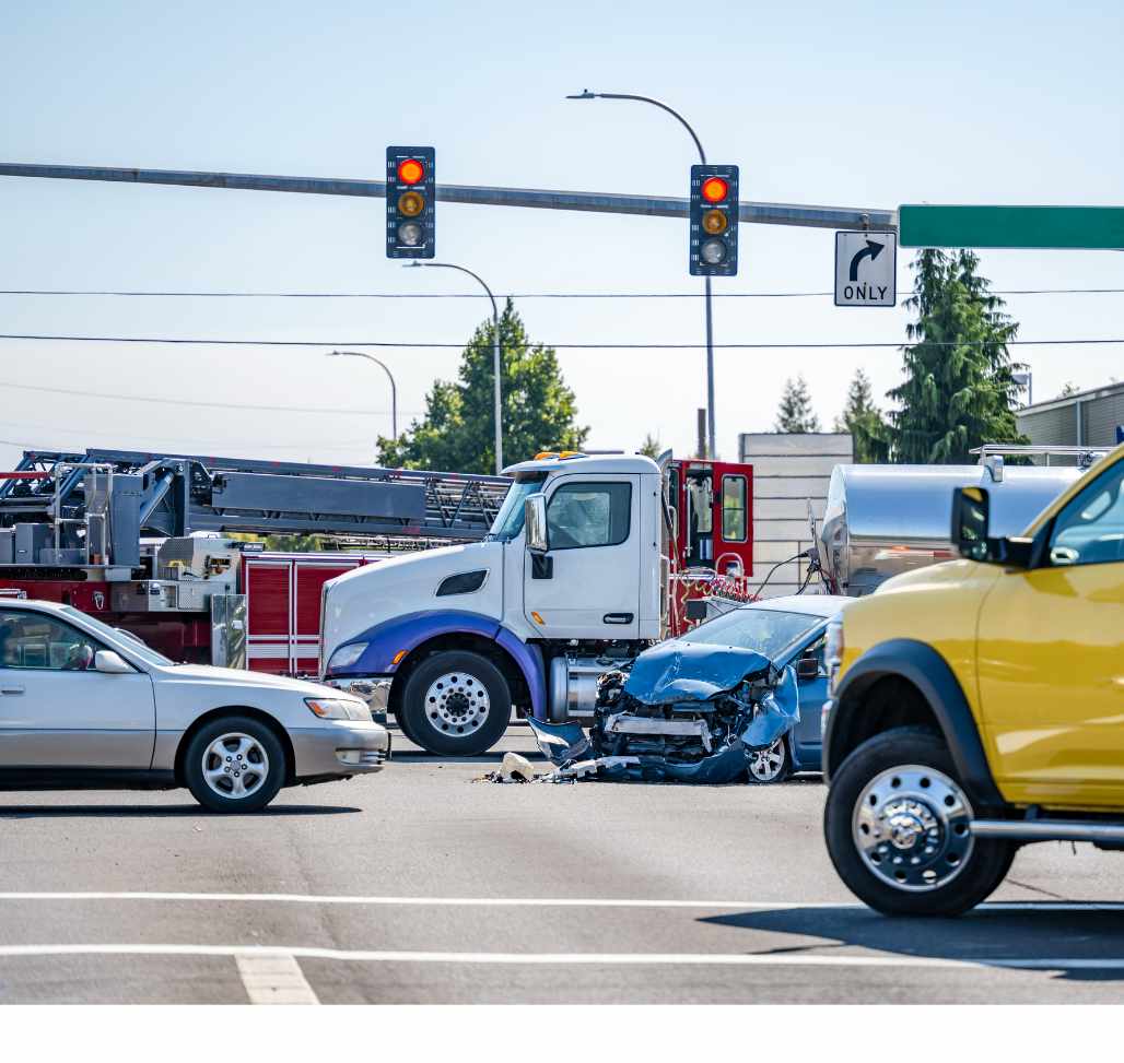 truck accident attorney tucker - Truck Accident in Tucker, Ga showing a semi-truck crashing into a blue car 