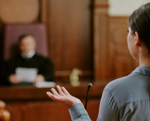 woman testifying in court trial in front of a judge - How many personal injury cases go to trial?