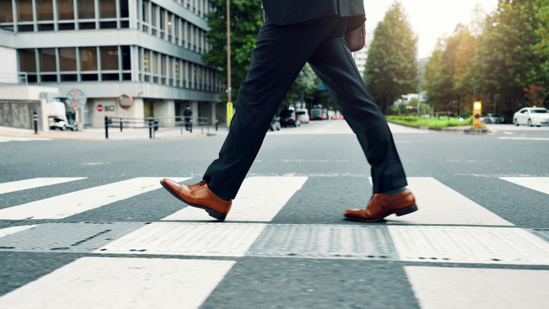 Pedestrian crossing a street using a crosswalk - Atlanta pedestrian accident lawyer