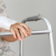 injured elderly patient with a walker and a cast on her arm - does Medicare cover injuries from a car accident?