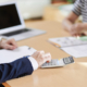Man making calculations during a meeting: Is a personal injury settlement considered marital property?